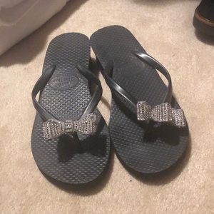 Jamie Kreitman black wedge flip flops